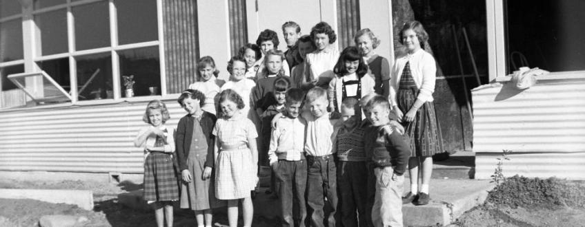 black and white photo of smiling kids